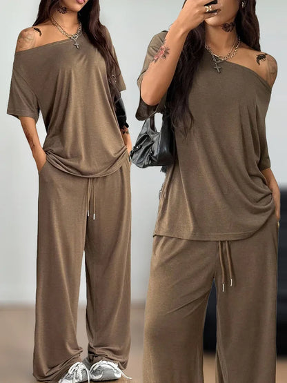 Women's Casual Solid Color Sports Two-Piece Loose Fit Pants Set with Slanted Hem and Wide Leg Design for Spring and Autumn