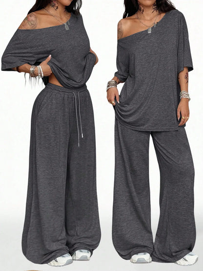 Women's Casual Solid Color Sports Two-Piece Loose Fit Pants Set with Slanted Hem and Wide Leg Design for Spring and Autumn