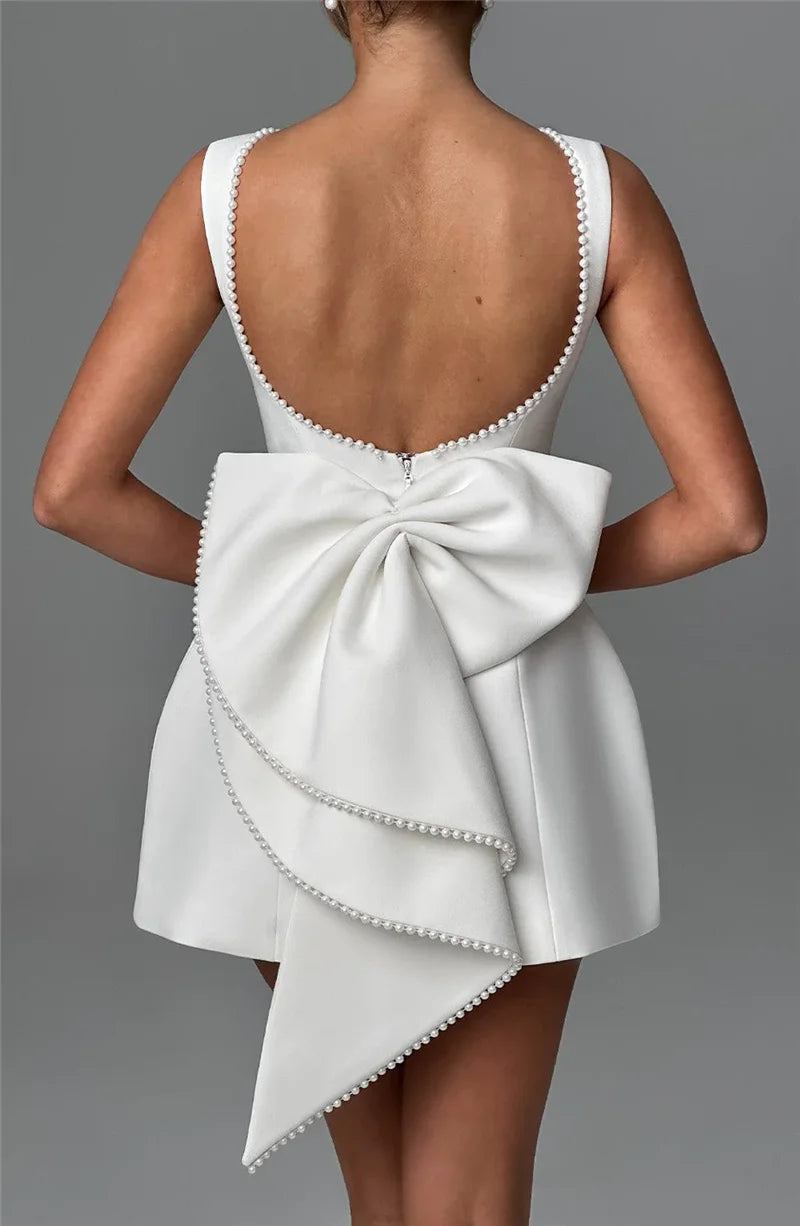 Mozision Pearl Bow Backless Sexy Mini Dress For Women Robe Fashion Zipper Sleeveless High Waist A-line Club Party Dress Elegant