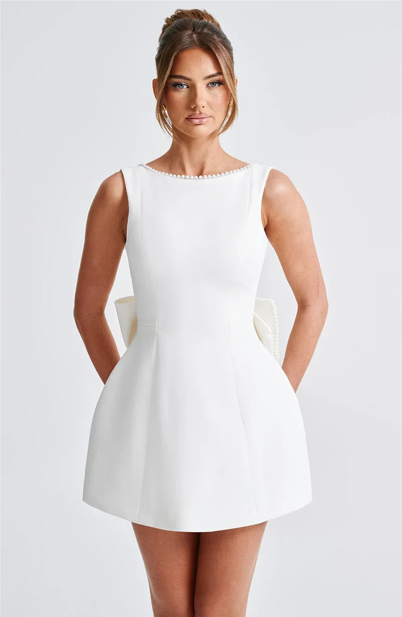 Mozision Pearl Bow Backless Sexy Mini Dress For Women Robe Fashion Zipper Sleeveless High Waist A-line Club Party Dress Elegant