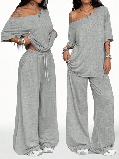 Women's Casual Solid Color Sports Two-Piece Loose Fit Pants Set with Slanted Hem and Wide Leg Design for Spring and Autumn
