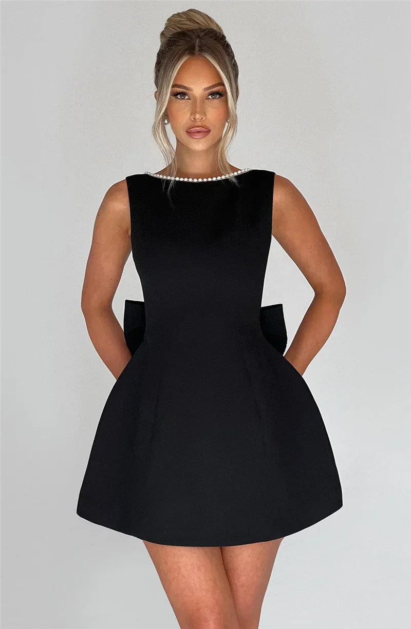 Mozision Pearl Bow Backless Sexy Mini Dress For Women Robe Fashion Zipper Sleeveless High Waist A-line Club Party Dress Elegant